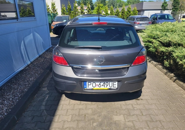 Opel Astra cena 18900 przebieg: 245000, rok produkcji 2012 z Poznań małe 121